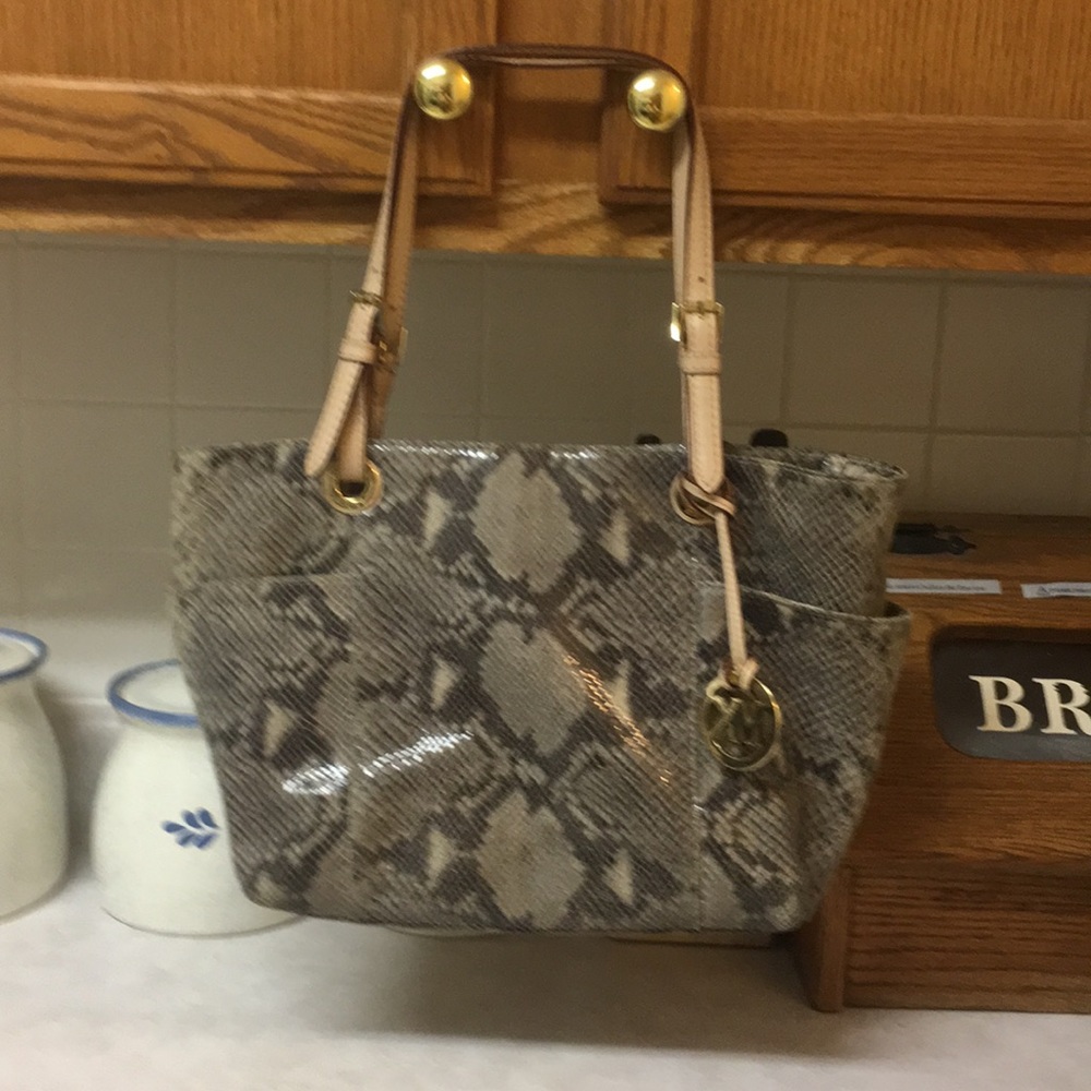 Gently used Michael Kors next snakeskin purse